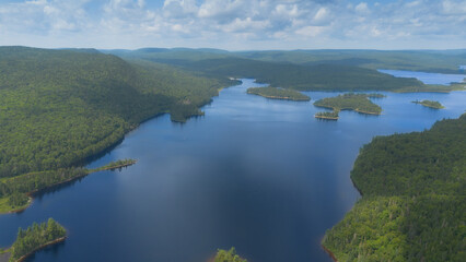 Fototapeta na wymiar Aerial view of a beautiful and wild fishing lake in the province of Quebec, Canada