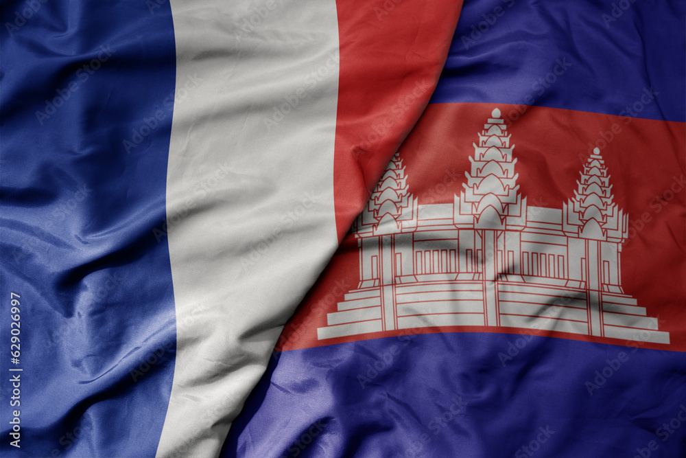 Wall mural big waving realistic national colorful flag of france and national flag of cambodia .