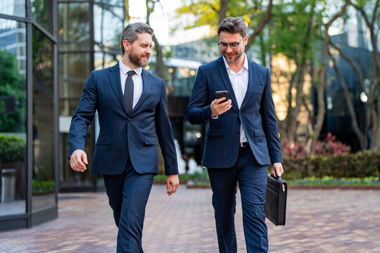 Business Men Walking Across The Street On American City Outdoor. Business Team Business Strategy.