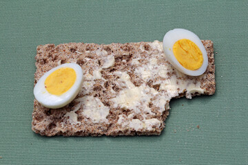 halved quail eggs on crisp bread, so simple