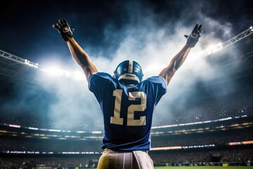American Football Player Scores a Touchdown.American football player celebrates scoring a touchdown in front of a roaring stadium crowd - obrazy, fototapety, plakaty
