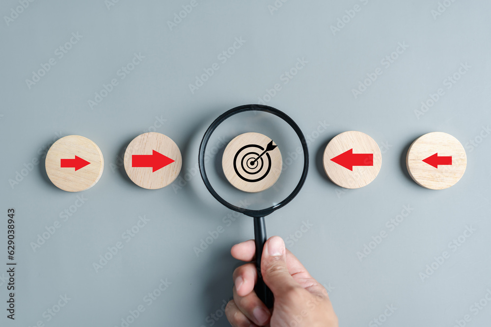 Leinwandbilder magnifier glass focus to target objective with business icons. planning development leadership and c