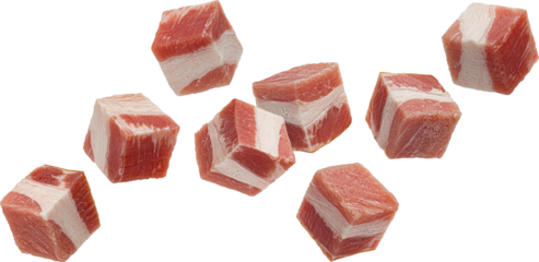 Falling bacon cubes, diced smoked ham isolated