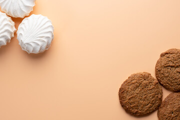 Background with oatmeal cookies and marshmallows