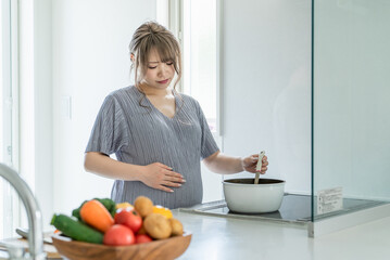 妊娠中に体調不良になる妊婦（疲労）

