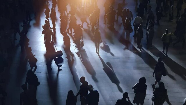 Business people walking on crowded city street in rush hour traffic