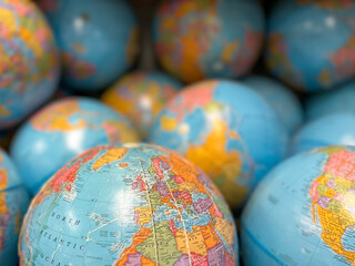 Background with multiple round globes in a pile.  Selective focus.
