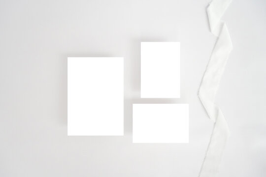 Invitation cards blank on minimalist background mockup photo for wedding invitations
