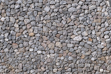 Antique stonewall texture material construction for background.