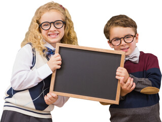 Digital png photo of happy caucasian children holding blackboard on transparent background