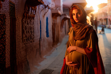 Naklejka premium Pregnant at Sunset. Muslim Woman Walking on the Street at Sunset. AI Generative 