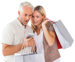 Digital png photo of caucasian couple with shopping bags using smartphone on transparent background