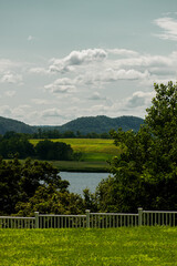 Fototapeta premium landscape with a white fence and sky