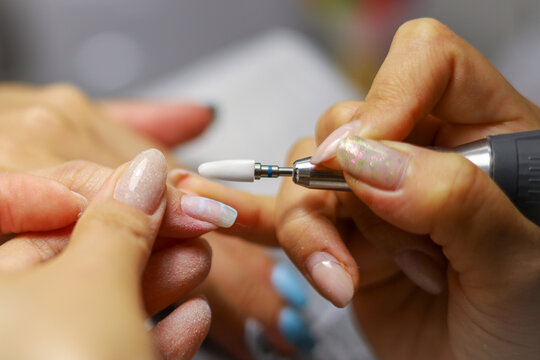 Nail treatment before coating with nail polish