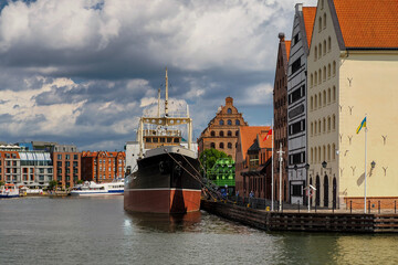 Poland, Gdansk, the old town, in the foreground a ship called Soldek, ore coal carrier