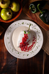 Chiles en Nogada, Typical dish from Mexico. Prepared with poblano chili stuffed with meat and fruits and covered with a walnut sauce. Named as the quintessential Mexican dish for national holidays.