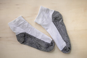 used socks on wood background