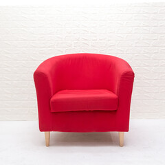 Luxurious wood frame armchair with red fabric seat
