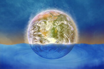 Climate change - depicting rising sea levels and extreme weather conditions on planet earth.