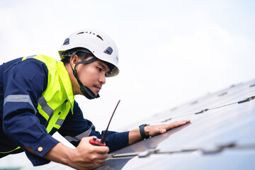 Engineer for quality control of solar panels in a power plant. Workers work in a solar power plant....