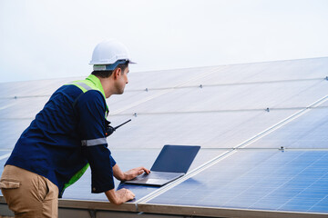 Expert engineer caucasian with laptop check maintenance Installation of solar panels. concept of...