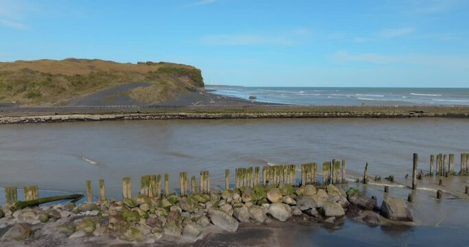 Aerial: Sandy Coastline and harbour, Patea, Taranaki, New Zealand