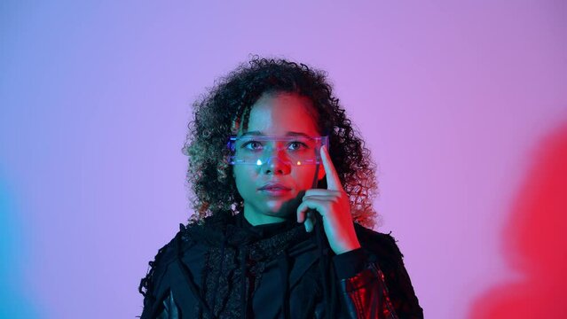 A black woman wearing and operating smart glasses.