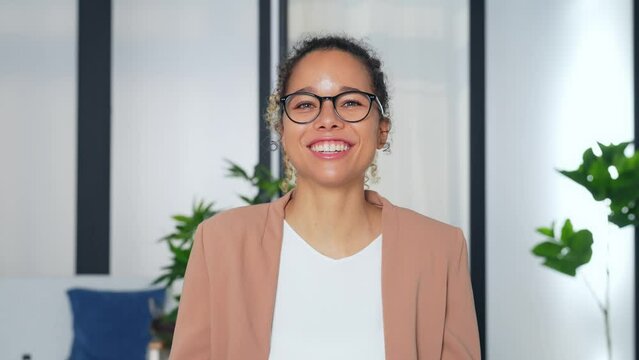 A Black Woman Talking To The Camera. Video Conference.