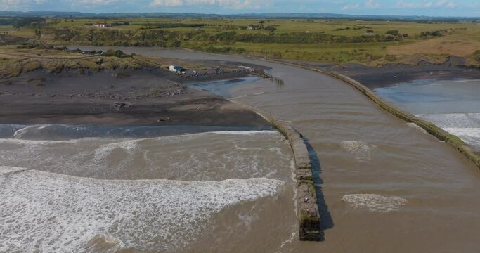Aerial: Sandy Coastline and harbour, Patea, Taranaki, New Zealand