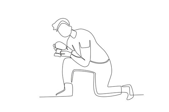 One continuous line drawing of a male photographer taking photos from below by squatting 
