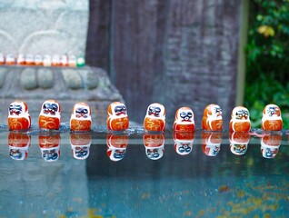 crowded daruma dolls in temple