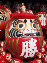 crowded daruma dolls in temple