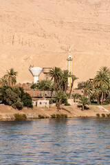 Naklejka premium Panoramic view of fertile banks of Nile and everyday life during river cruise River near Luxor Egypt direction assuan