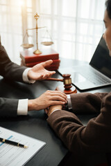Judge gavel with scales of justice, Business and lawyer or counselor consulting and discussing...