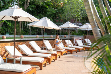 lounge chairs and umbrellas on the beach