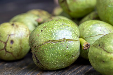 Ripe walnuts with green shells