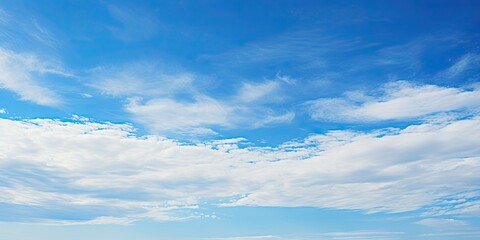 Fototapeta premium Summer sky. Blue and white cloudscape. Nature beauty. Abstract sky with clouds. Sunlight beautiful view