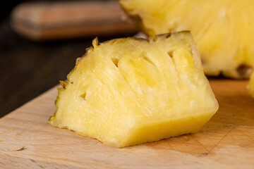ripe yellow pineapple cut into pieces