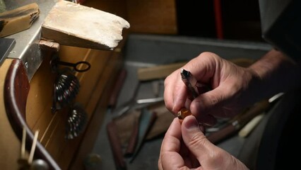  Handmade Jewel. Close-up Of The Hands Of A Goldsmith Jeweler Working With Tools In Craft Workshop. Job Craftsman