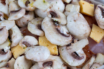 sliced mushrooms while cooking dishes with champignons