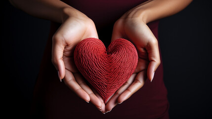 Obraz premium A pair of hands forming a heart symbol, advocating for love and respect in relationships 