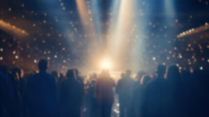 People at an award ceremony standing together on stage at a blurred event