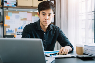 Smiling confident mature businessman leader looking at camera in office.