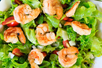 Boiled shrimp on green salad