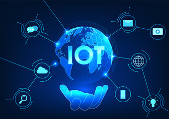 Internet of Things technology The hand holding a globe inside has the letters IOT with a circuit line connected to the icon. The Internet of Things technology concept is used all over the world