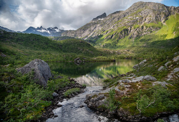 Fototapeta na wymiar Beautiful Scandinavian landscape, mountains and a lake on the Vesteralen archipelago in Norway
