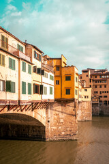 Fototapeta na wymiar Ponte Vecchio bridge over the Arno river in Florence, Tuscany, Italy.