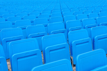 Empty blue seats in a stadium