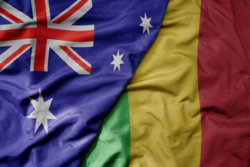 big waving realistic national colorful flag of australia and national flag of mali .