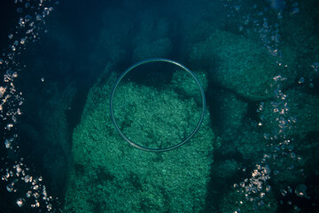 Stony sea bottom with bubbles
